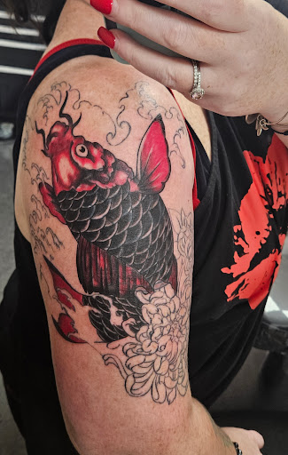 Explore dirty hands clean money tattoo ideas, creative tattoo ideas in Worcester, available at Unholy Grail Tattoo Inc