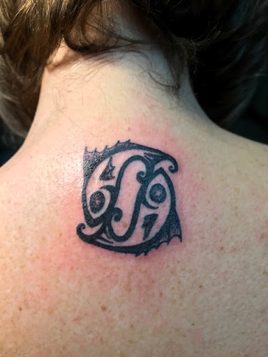 Explore rose tattoo idea, creative tattoo ideas in Olympia, available at Primeval Ink Tattoo