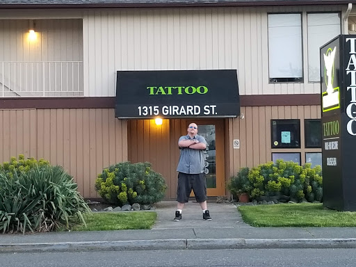 Explore leg tattoo ideas black male, creative tattoo ideas in Bellingham, available at Kalamalka INK Tattoo