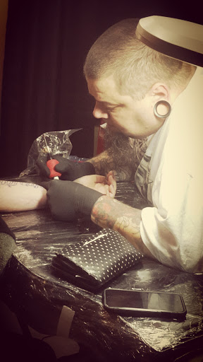 Explore daddy and son tattoo ideas, creative tattoo ideas in Terre Haute, available at Black Tides Tattoos And Fine Art