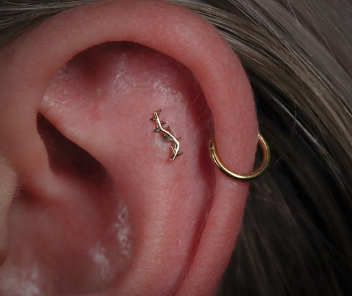 Explore chucky tattoo ideas, creative tattoo ideas in Terre Haute, available at Piercings by Brett Rice - godpiercethequeen