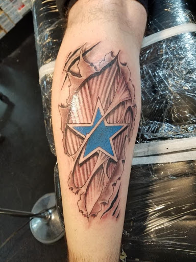 Explore man in the arena tattoo ideas, creative tattoo ideas in Pelham, available at Tattoo Fever