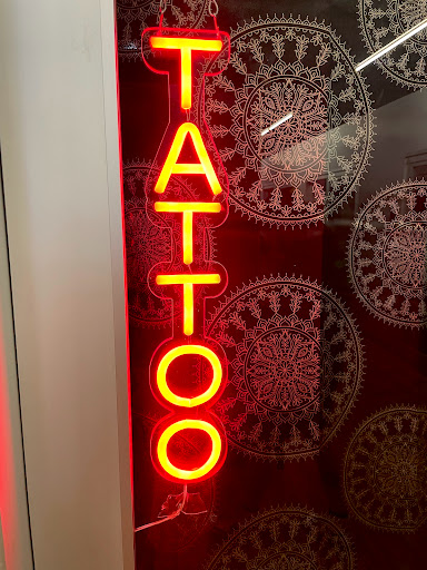 Explore blue flame tattoo ideas, creative tattoo ideas in Cincinnati, available at Opal Moon Tattoo