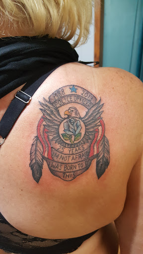 Explore pink panther tattoo ideas, creative tattoo ideas in Marshall, available at Palmers Tattoo Parlor