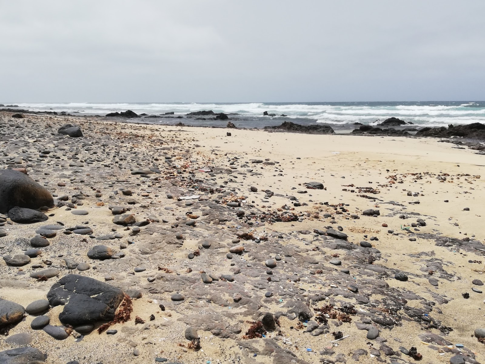 Foto di Playa de la Turbia con baia piccola