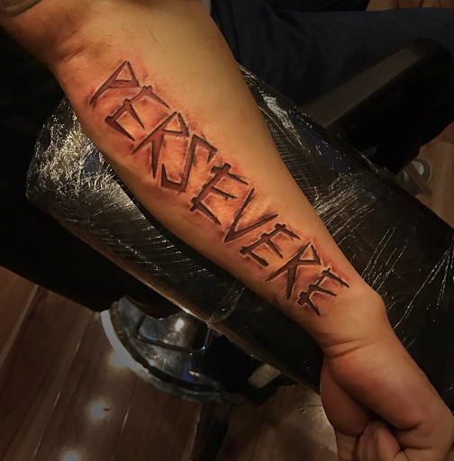 Explore love yourz tattoo ideas, creative tattoo ideas in Oakland Gardens, available at Art House Collective
