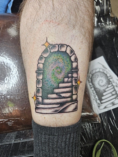 Explore small dinosaur tattoo ideas, creative tattoo ideas in Fort Collins, available at Rocksteady Tattoo