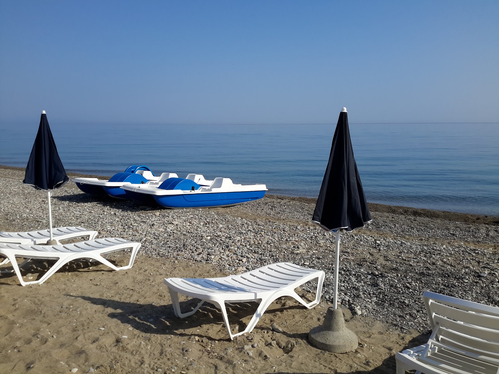 Valokuva Cariati beachista. pinnalla sininen vesi:n kanssa