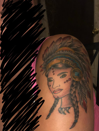 Explore female tattoo ideas for lower back, creative tattoo ideas in Loveland, available at Satori Tattoo