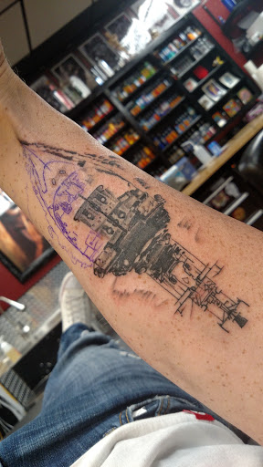 Explore marathon tattoo ideas, creative tattoo ideas in Lubbock, available at Emerald Empire Tattoo & Tattoo Laser Removal