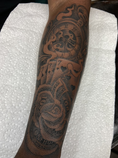 Find simple cat tattoo ideas for your next unique tattoo in Everett at Ferry Street Ink