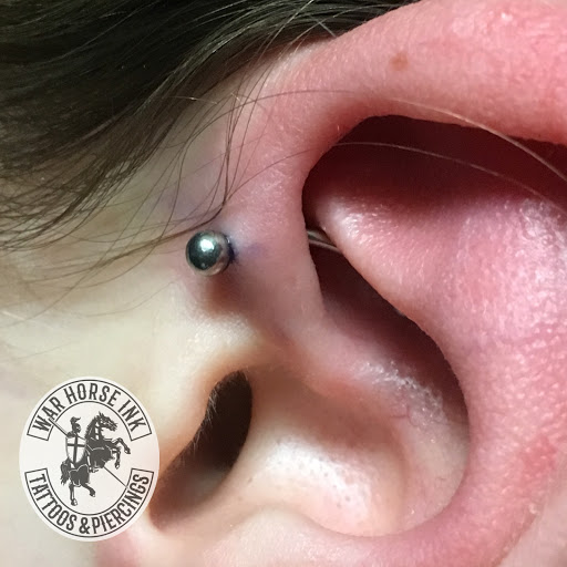 Explore tattoo ideas for cover ups, creative tattoo ideas in Kent, available at War Horse Ink