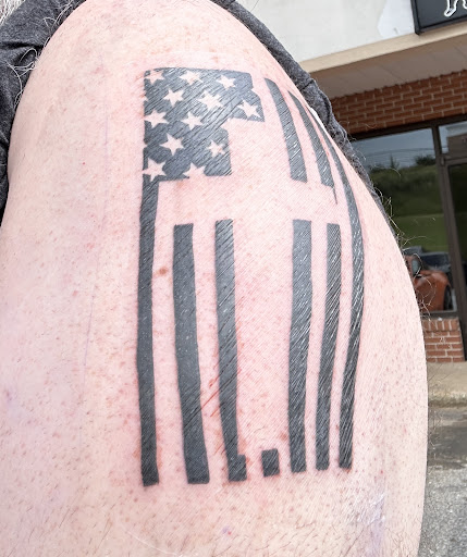 Find small cat tattoo ideas for your next unique tattoo in Stockbridge at Black Rose Tattoo Collective