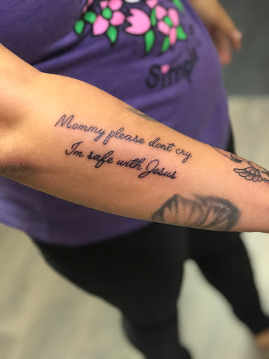 Explore son tattoo ideas, creative tattoo ideas in Sanford, available at Hudson & Company Tattoo Studio