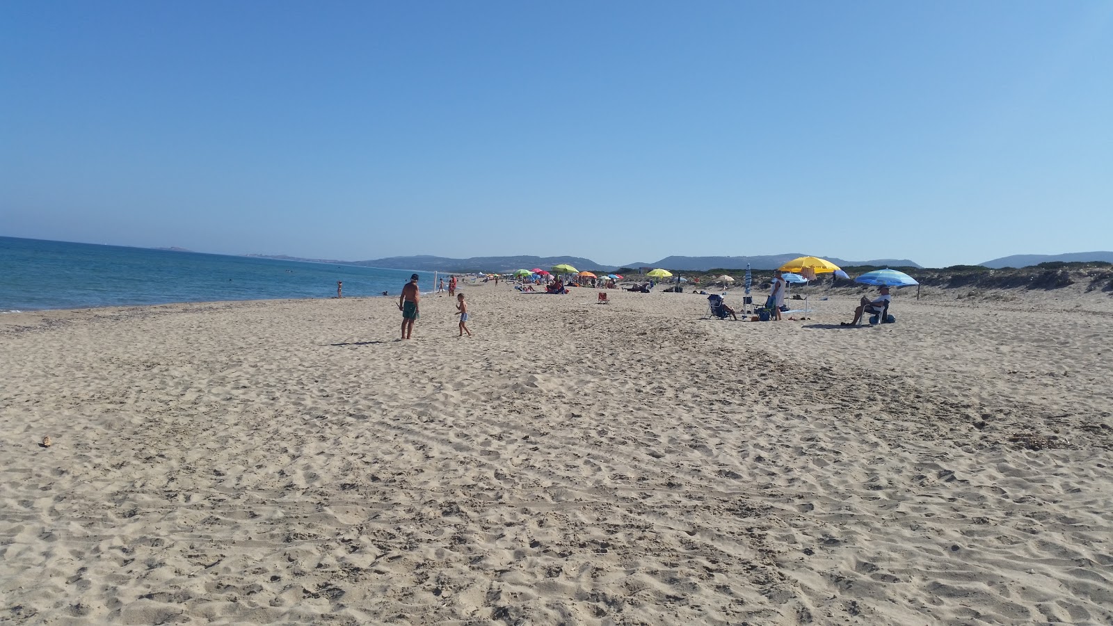 Spiaggia della Baia delle Mimose'in fotoğrafı - Çocuklu aile gezginleri için önerilir