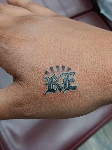 Explore lower back cover up tattoo ideas, creative tattoo ideas in El Paso, available at American Tattoo Society of Ft Bliss