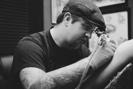 Explore alice in wonderland tattoo ideas, creative tattoo ideas in Neptune, available at Neptune Tattooville