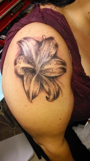 Explore men's words tattoo ideas, creative tattoo ideas in Los Angeles, available at South Central Tattoos