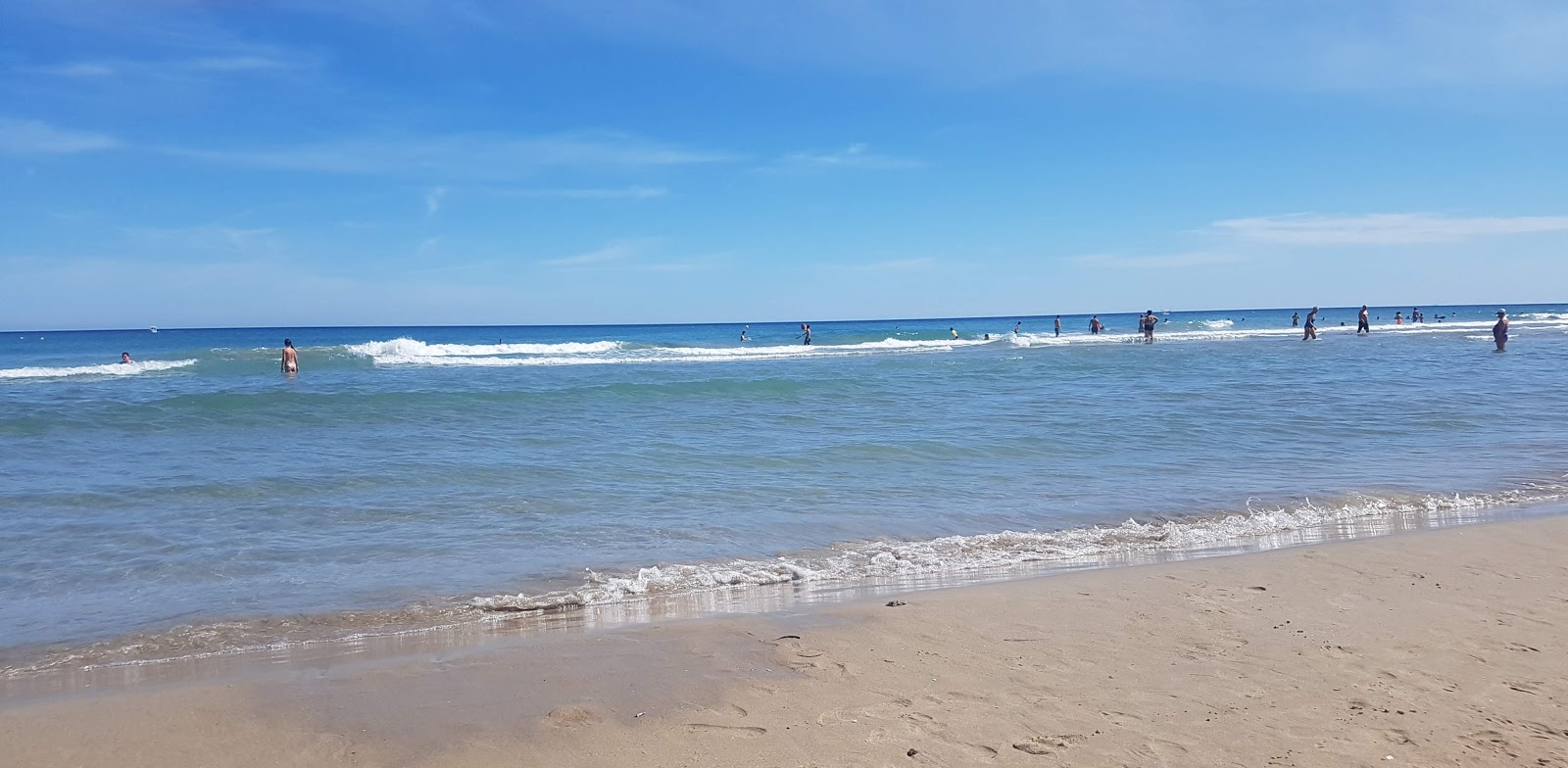 Photo de Playa la Zenia avec petite baie