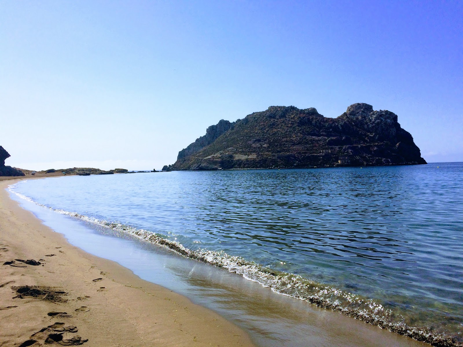 Foto av Playa de las Delicias med long bay