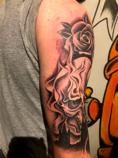 Explore wrestling tattoos ideas, creative tattoo ideas in Cape Coral, available at UNRIVALED INK