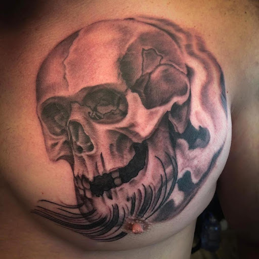 Explore assassins creed tattoo ideas, creative tattoo ideas in Merced, available at Merced Tattoo and Piercing Co.