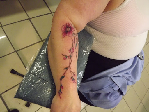 Explore trafalgar law tattoo ideas, creative tattoo ideas in Princeton, available at Custom Dreams Tattooing and Body Piercing