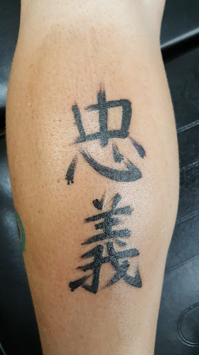 Explore loyalty tattoo ideas for men, creative tattoo ideas in Pocatello, available at Tys Tattoos