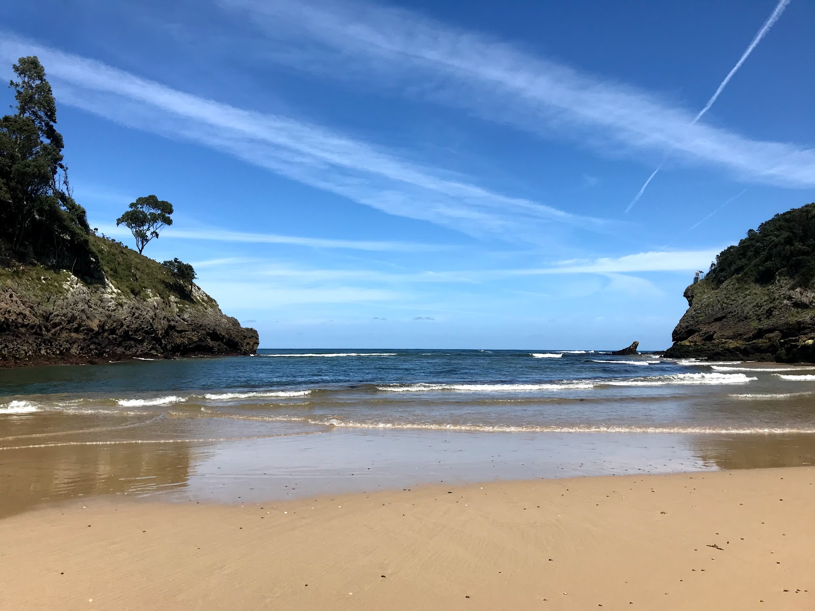 Photo of Pechon Beach with turquoise pure water surface