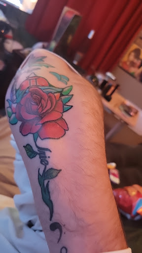 Explore mental health ribbon tattoo ideas, creative tattoo ideas in Reading, available at INKjection tattoo & body piercing.LLC