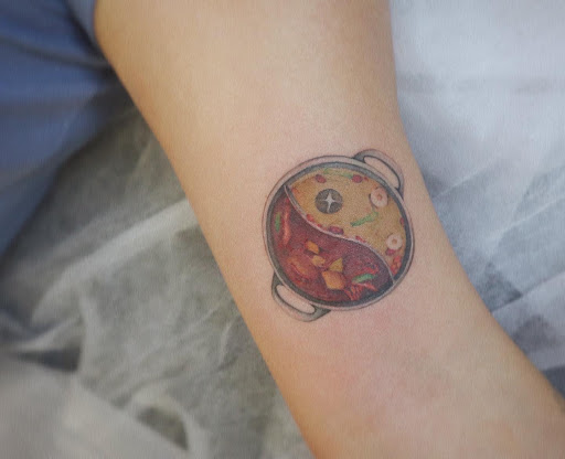 Explore nightmare before christmas tattoo ideas, creative tattoo ideas in Orange, available at Baron Art Tattoo