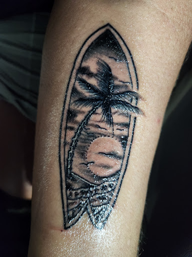 Explore dog bone tattoo ideas, creative tattoo ideas in San Diego, available at Above All Tattoo - Pacific Beach