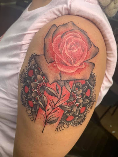 Explore dragon tattoo ideas for women, creative tattoo ideas in Arlington, available at Urbans Tattoo & Piercing Studio