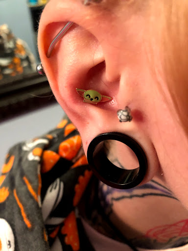 Explore tattoo ideas about travel, creative tattoo ideas in Palm Harbor, available at Angry Owl Tattoo and Piercing