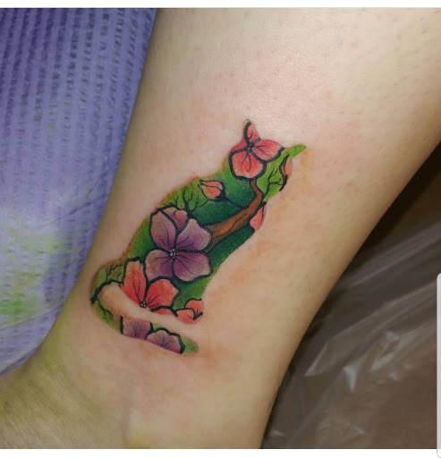 Explore caribbean tattoo ideas, creative tattoo ideas in Ambler, available at Tattoo GalaxyAmbler Piercing & Custom Tattoos