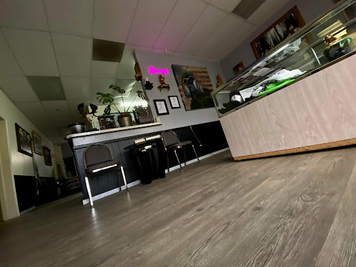 Explore hawaiian tattoo ideas for men, creative tattoo ideas in Charleston, available at Nemesis Tattoo and Art Gallery