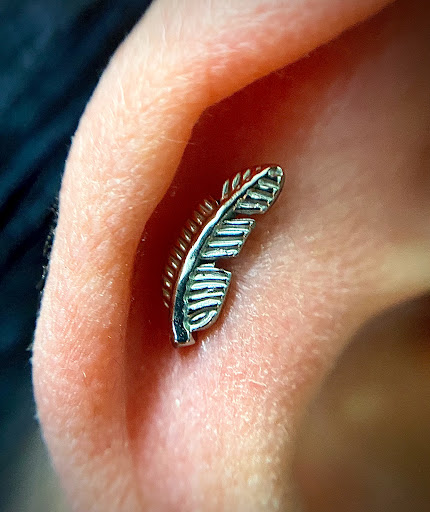 Explore family tattoo ideas for females small, creative tattoo ideas in Orange, available at Symbiosis Body Piercing