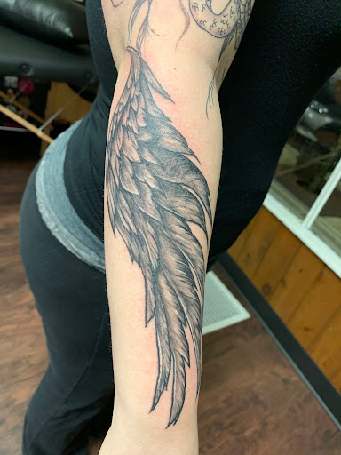 Explore wall-e tattoo ideas, creative tattoo ideas in Molalla, available at Back40Tattoo