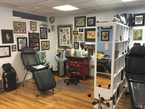 Explore snoopy and woodstock tattoo ideas, creative tattoo ideas in Pittsburgh, available at Pittsburgh Tattoo Company