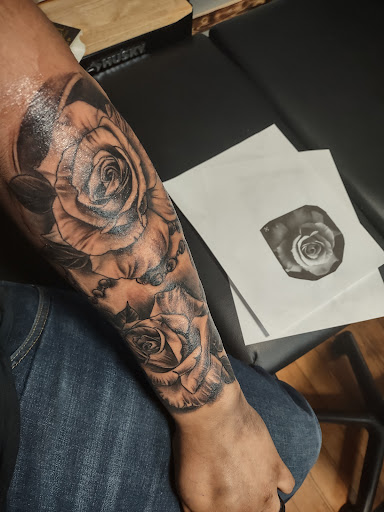 Explore skull rose tattoo ideas, creative tattoo ideas in Lake Villa, available at Eternal Tiger Tattoo