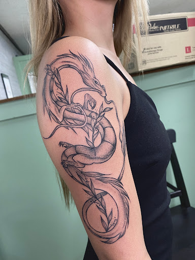 Explore globe tattoo ideas, creative tattoo ideas in Austin, available at Copperhead Tattoo & Piercing