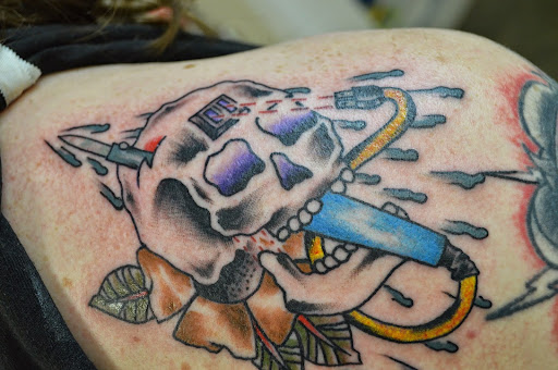 Explore moonshine tattoo ideas, creative tattoo ideas in Hattiesburg, available at Hattiesburg Tattoo