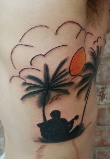 Explore february birth flower tattoo ideas, creative tattoo ideas in Meridian, available at SK-Tattoo1