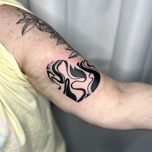 Explore lioness tattoo ideas for females, creative tattoo ideas in Wilmington, available at Rogue Tattoo Studio