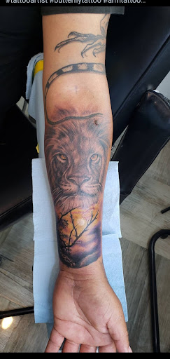 Explore lion sleeve tattoo ideas, creative tattoo ideas in Riverside, available at Darkstar Tattoo CA