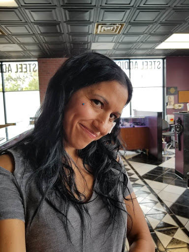 Explore color flower tattoo ideas, creative tattoo ideas in Toledo, available at Steel Addictions