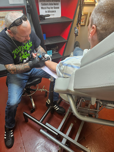 Explore girly tattoo ideas for a sleeve, creative tattoo ideas in Birmingham, available at Classic 13 Tattoo