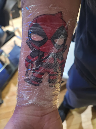 Explore religious tattoo ideas for women, creative tattoo ideas in Chicago, available at Archer Avenue Tattoo & Body Piercing