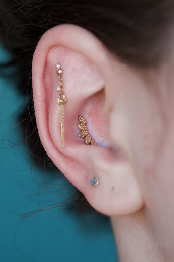 Explore female cover up tattoo ideas, creative tattoo ideas in Boston, available at Arcadia Body Piercing