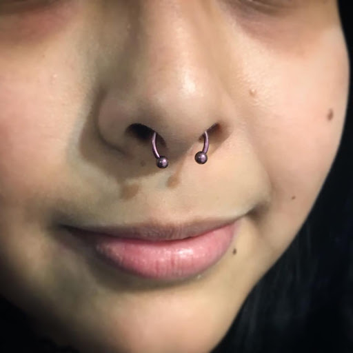 Explore house tattoo ideas, creative tattoo ideas in Louisburg, available at Purple Dot Piercings